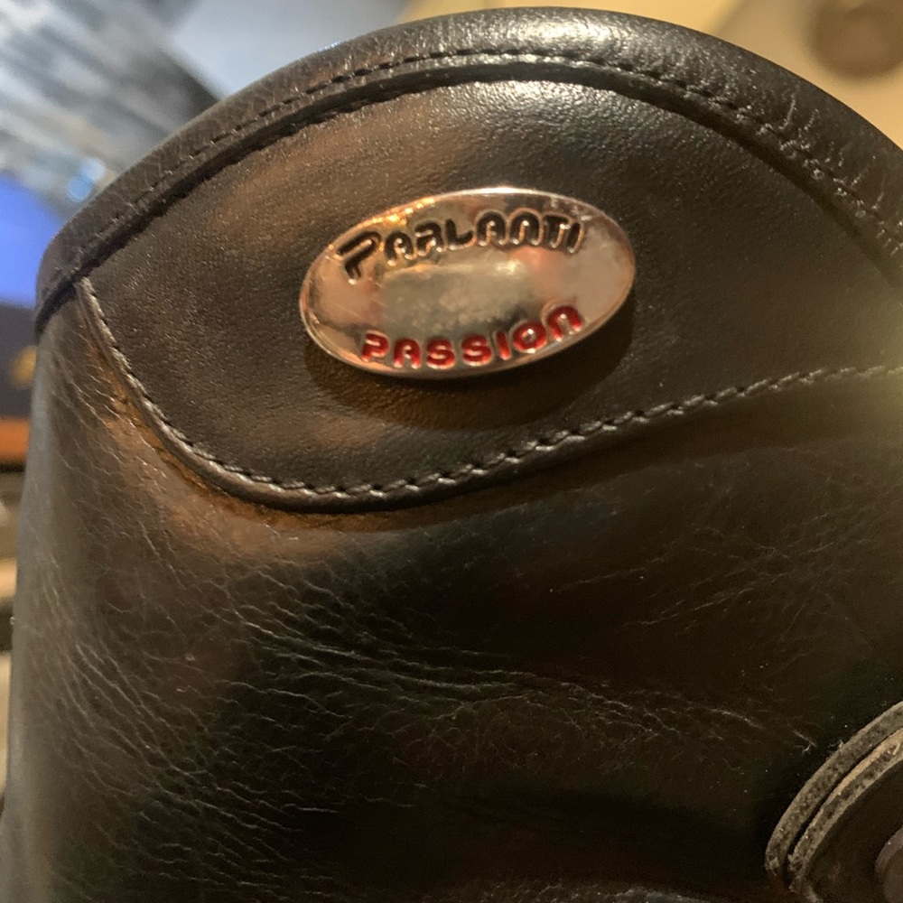 One owner, lightly used riding boots with a bag.